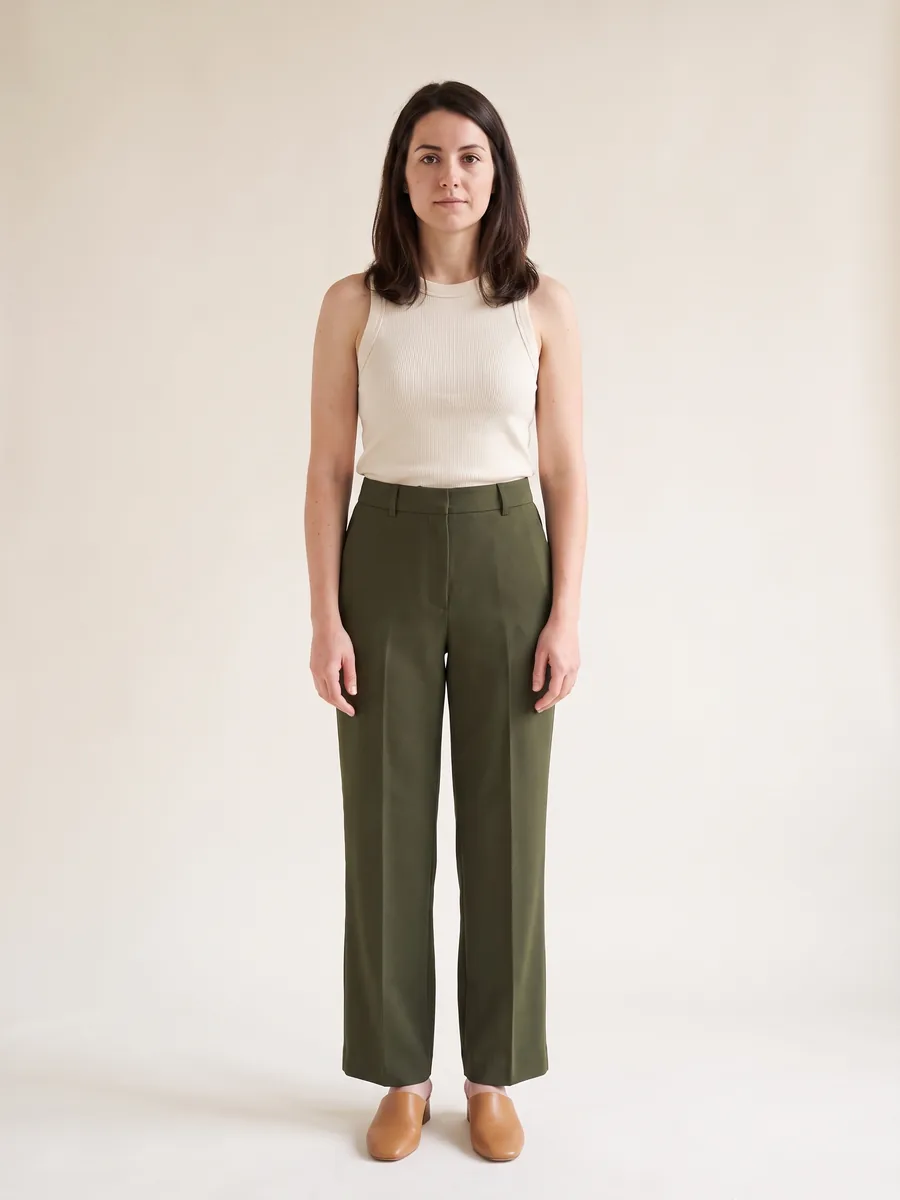 The same shopper wearing only the ribbed knit tank and wide-leg trouser